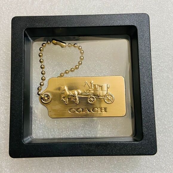 Coach Accessories - Coach Gold Bag Tag